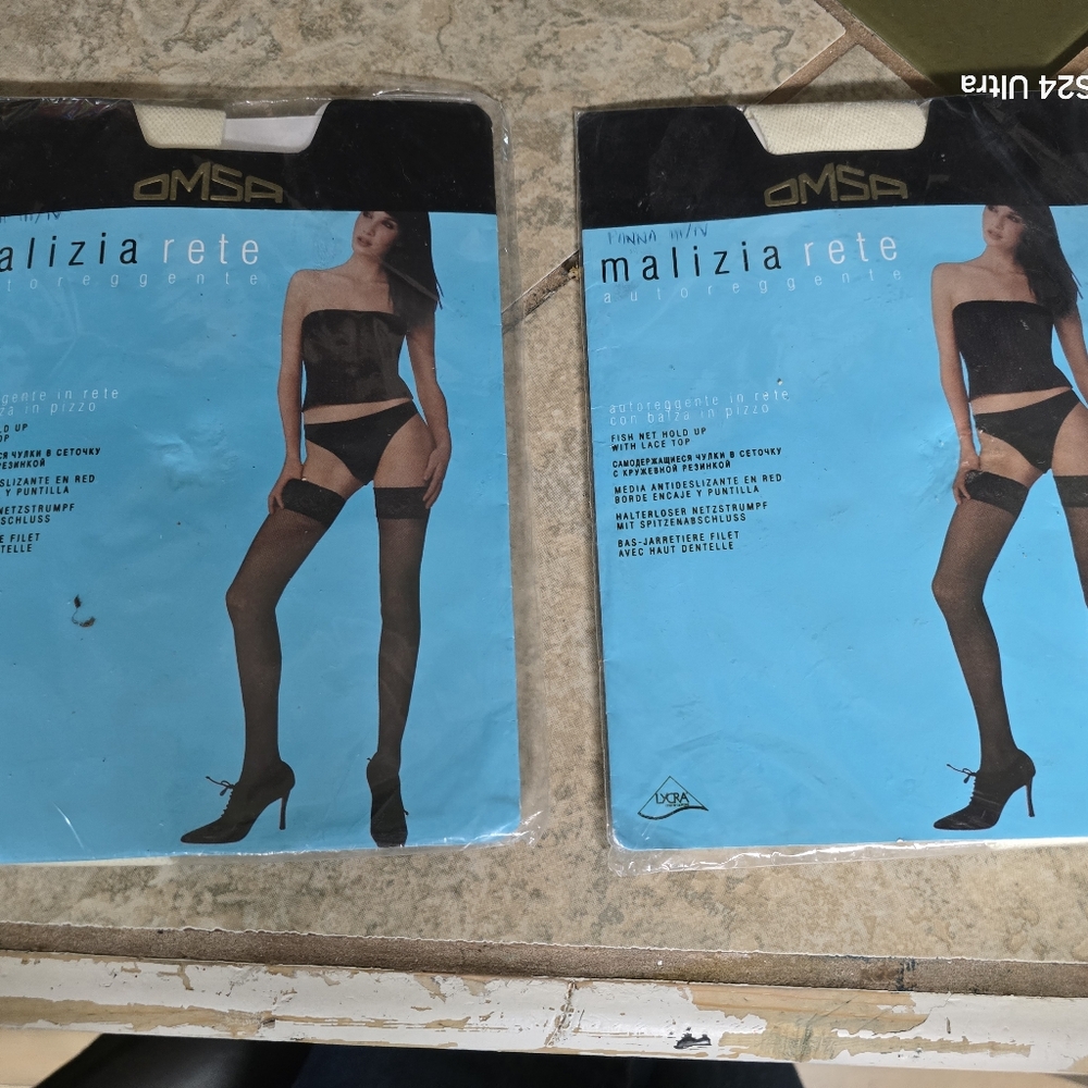 2 pairs of Ivory colored Fishnet hose with silicone hold up lace top